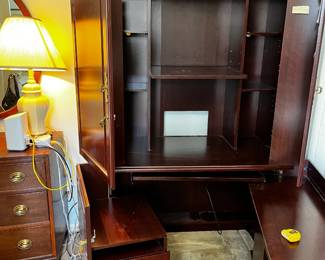 #34	Laminate Armoire w/4 doors and Shelves and pull-outus  (doors fold-out for more cubbies and storage) - 42x23x72 - You Move	 $45.00 			