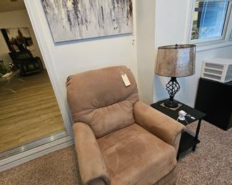 ez boy chair, side table and lamp, art work