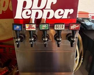 Dr. Pepper Branded soda machine with hoses, handles and drip pan. Works