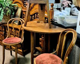 Antique furniture. Oak drop leaf table and bent wood chairs