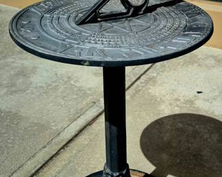 Much vintage cast iron outdoor items. Degginger Foundry sundial-very cool!!
