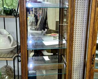 Decorative side entry curio cabinet