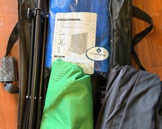 Photography back drop with green, black and blue drops