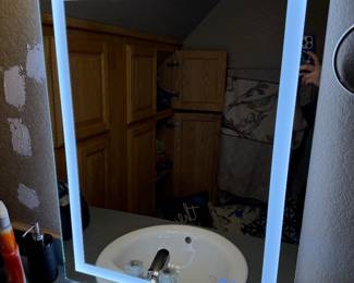 Close up of heated and light up mirror. Great for clearing steam