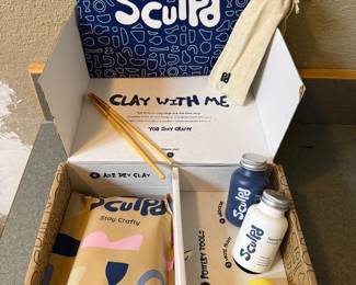 Clay sculpting kit with ideas and instructions. Never used