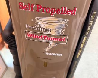 #97 - $50 - Hoover wind tunnel mach 6.9 self propelled vacuum with bags