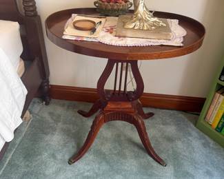 #61 - $150 - vintage Mahogany lyre table oval top 25x18x26