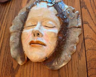 #52 - $58 - Woodman ceramic pottery mask of woman 9x10