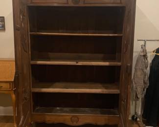 inside  view of huge wood vintage armoire 