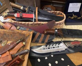 YUP    WE  HAVE A FEW COLLECTOR KNIVES HERE - ALL RANGES  FUN TO BE HAD PERUSING  THIS BASKET
