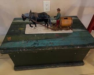 Vintage painted trunk and Black Forest carved beer wagon