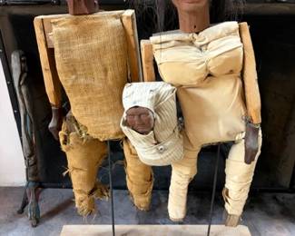 Navajo doll couple with child on stand, unknown artist
