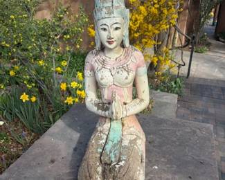 Vintage Thai wooden carved kneeling buddha