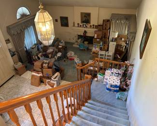 The living room before and after Heritage staging. 