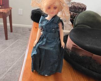 Plastic Doll in Paper dress