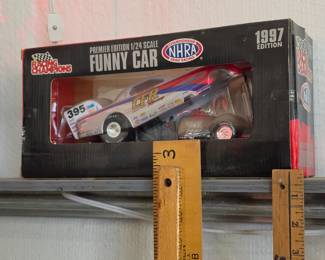 1997 Racing Champions Premier Edition 1/24 scale NHRA Funny Car diecast model in its original packaging