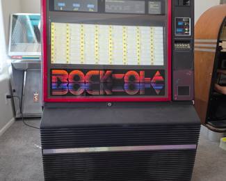 The jukebox is a Rock-Ola Model 484. This model was produced around 1980. We were able to get it to play.