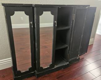 mirror and black storage hald open