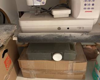 Sewing machine with table