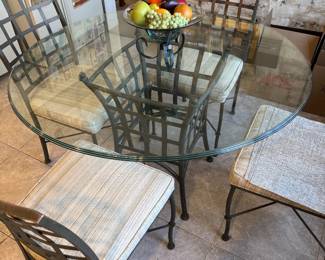 Beveled Glass Round Table with Metal Bass- 48” W x 30” H $250.