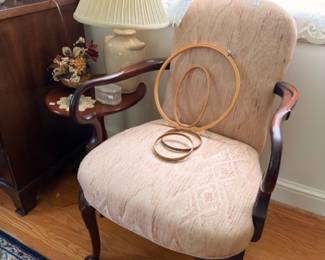 Queen Anne upholstered armchair with vintage embroidery hoops