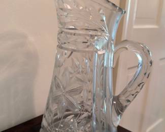 Cut crystal pitcher with pinwheel and star pattern
