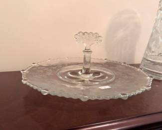 Vintage pressed glass center-handle serving tray with scalloped edge
