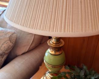 Green and gold turned pottery table lamp with pleated shade