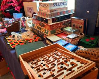 Vintage wooden labyrinth marble maze game with board games and baseball glove