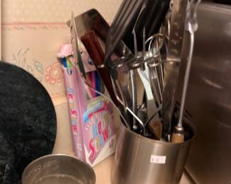 Stainless kitchen utensil crock with flour sifter and cutting board
