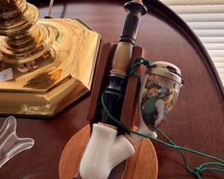 Vintage Meerschaum pipe with long stem on wooden stand