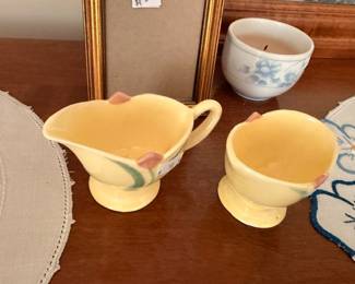 Yellow pottery creamer and sugar bowl with pink tulips