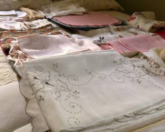 Large lot of vintage linens embroidered tablecloths napkins and placemats