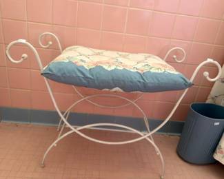 White wrought iron vanity bench with cushion