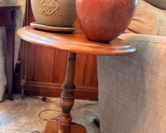 Mahogany pedestal side table with stoneware planter and terracotta jug