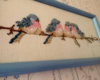 Framed cross-stitch of birds on branch