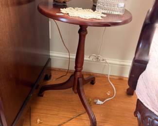 Mahogany tripod pedestal side table with floral arrangement