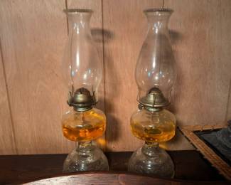 Pair of antique amber glass oil lamps