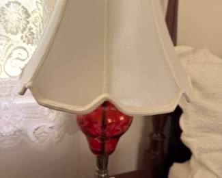 Cranberry glass lamp with ivory scalloped fabric shade