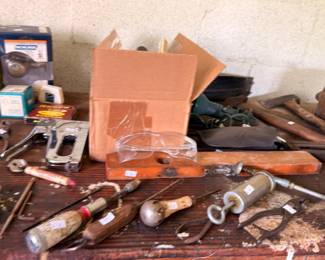 Antique woodworking tools hand drill level and chisels
