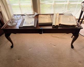 Queen Anne console table with vintage Nashville newspapers and crystal