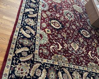 77. Red, Tan & Black Wool Hand Knotted Rug (14" x 10")