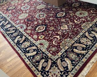 77. Red, Tan & Black Wool Hand Knotted Rug (14" x 10")