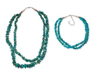 1380 Two Southwest turquoise beaded necklaces Mid/late 20th century One clasp stamped: 925 Comprising a chunky double-strand necklace with graduated turquoise nuggets, as well as a small double-strand turquoise choker necklace with smooth turquoise chips and nuggets, each with silver cone clasps 24.5" L & 21"-18" L 281.2 grams gross Estimate: $200 - $300