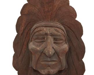 1197 A Folk Art carved wood Indian head Mid-20th century Unmarked 22.625" H x 17.25" H x 8.25" D Estimate: $300 - $500