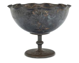 1181 An Arts & Crafts silvered hammered copper bowl Early 20th century Unmarked The footed bowl with piecrust rim 9.75" H x 12" Dia. Estimate: $500 - $700