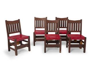 1079 A group of five Gustav Stickley V back side chairs, no. 1305 Circa 1902 Each stamped with red joiner's compass mark Each with five-slat back above later red leather-wrapped seat 5 pieces Each: 36" H x 19" W x 20" D Estimate: $1,000 - $1,500