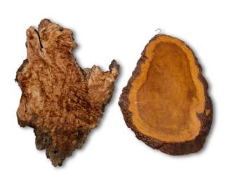 1387 Two live edge burlwood cross sections 20th century The smaller with a wall-hanging hook 2 pieces Larger: 46" H x 32.5" W x 2.25" D; Smaller: 39.5" H x 28" W x 1.875" D Estimate: $200 - $400
