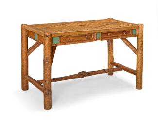 1287 An Old Hickory style Adirondack desk Early/mid-20th century With marquetry top above two drawers, raised on natural wood supports joined by an H-stretcher 30.75" H x 49.25" W x 25.75" D Estimate: $800 - $1,200