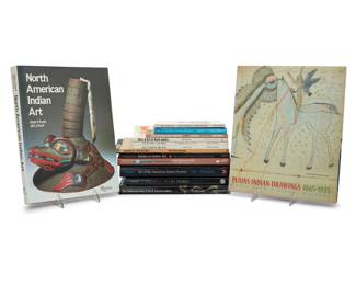 1420 A group of books on Native American subjects 1974-1998 Fifteen works:  "Plains Indian Drawings 1865-1935: Pages from a Visual History," 1996 "North American Indian Art," 1982 "Art of the American Indian Frontier: The Chandler-Pohrt Collection," 1992 "Hopi Kachina Dolls and Their Carvers," 1991 "The Smithsonian Book of North American Indians: Before the Coming of the Europeans," 1986 "Kachinas in the Pueblo World," 1994 "Masterpieces of American Indian Art," 1995 "Seven Families in Pueblo Pottery," 1974 "By the Power of Their Dreams: Songs, Prayers, and Sacred Shields of the Plains Indians," 1994 "Zuni Fetishes and Carvings," 1998 "Dolls & Toys of Native America: A Journey Through Childhood," 1995 "Dancing Colors: Paths of Native American Women," 1992 "Becoming Brave: The Path to Native American Manhood," 1992 "Navajo Weaving: Art in Its Cultural Context," 1987 "l'Empreinte du Sable," 1992  15 pieces Largest: 12.375" H x 10.5" W x 1.25" D Estimate: $100 - $200